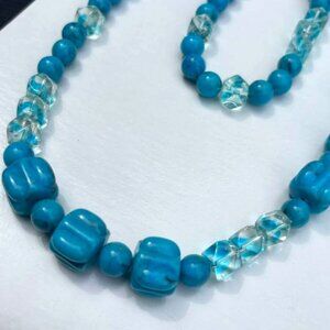 STRAND OF LOVELY TURQUOISE AND WHITE LUCITE BEADS